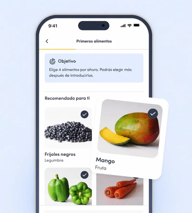 La pantalla «Primeros alimentos» de la aplicación, con instrucciones sobre cómo servir el mango